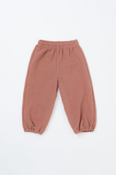Avauma Breeze Jogger Pants in rose wood color, flat lay showing breathable cotton and elastic cuffs.